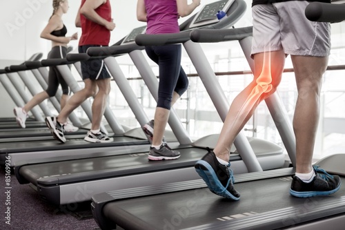 Highlighted knee of man on treadmill