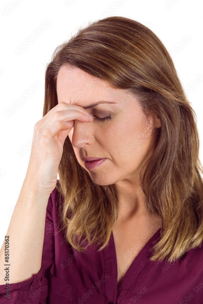 Pretty brunette with headache touching her forehead Pretty brunette with headache touching her forehead