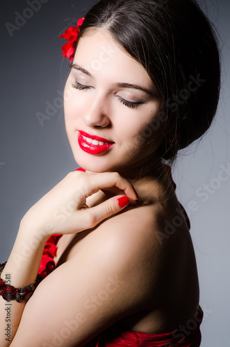 Woman portrait against dark background