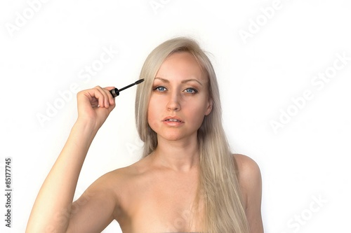 Beautiful blonde woman with eye stick