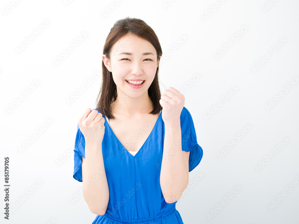 ガッツポーズ・若い女性
