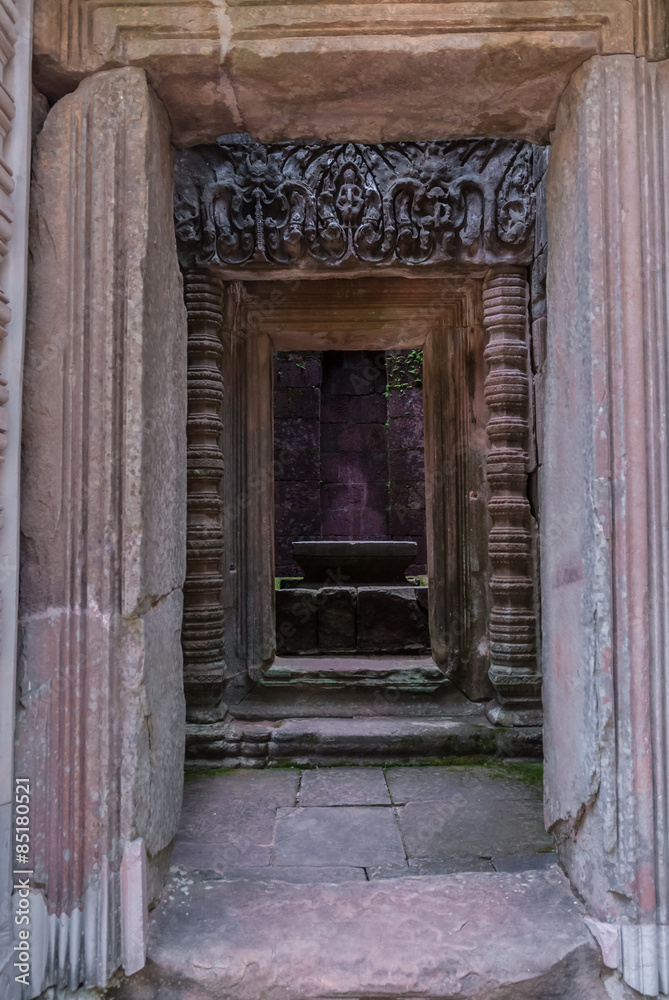 lintel and columns with bas-reliefs inside the prasat of the temple of chau say tevoda in siam reap, cambodia