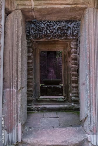 lintel and columns with bas-reliefs inside the prasat of the temple of chau say tevoda in siam reap, cambodia