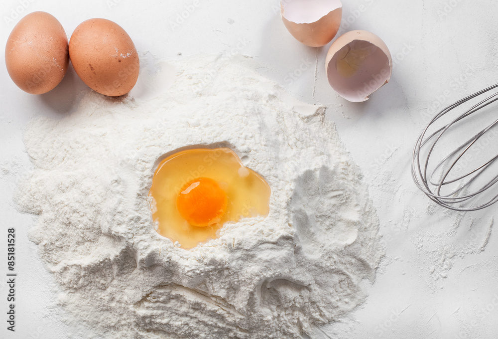white background with egg in flour white background with egg in flour