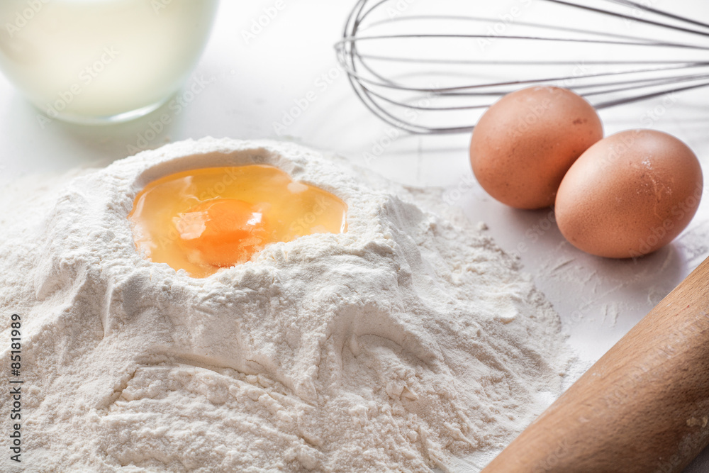 white background with egg in flour white background with egg in flour