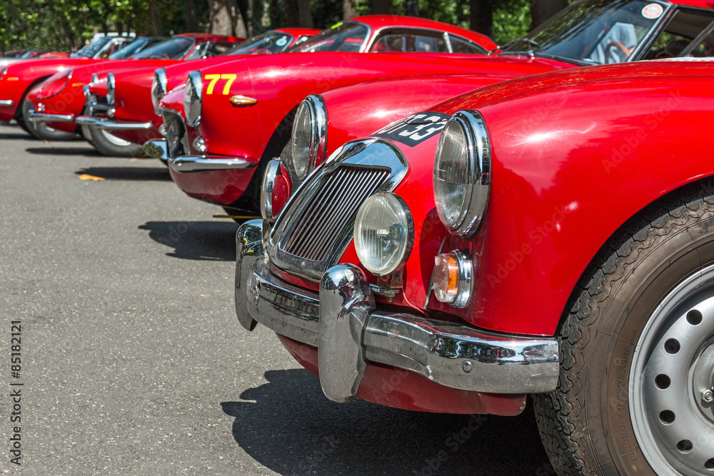 exposition of old red car in line exposition of old red car in line