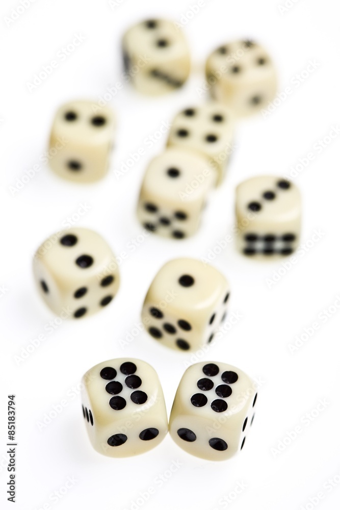 close up view of some dice on white