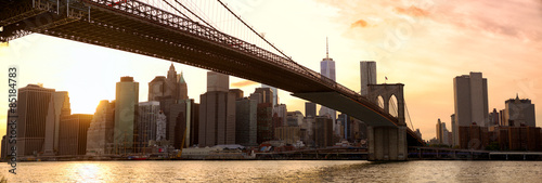 Photography Manhattan skyline panorama and Brooklyn Bridge at sunset, New York
