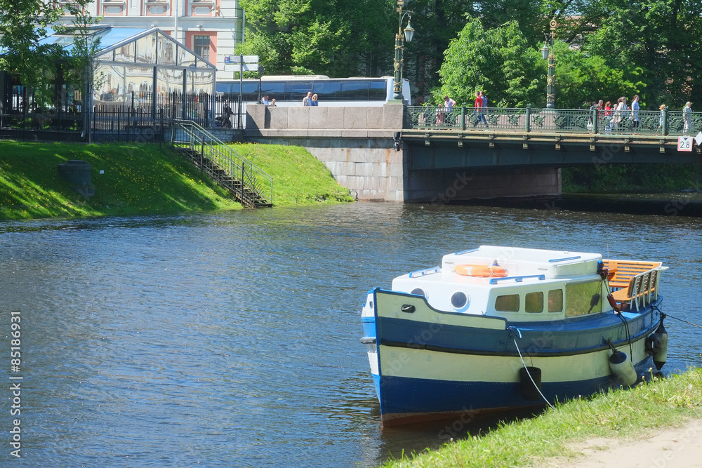 boat on a Moika river in St. Petersburg boat on a Moika river in St. Petersburg