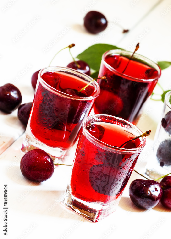 Fresh cherry juice with berries, selective focus Fresh cherry juice with berries, selective focus