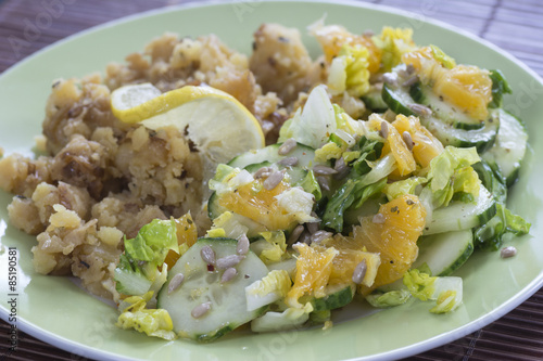 Mashed potatoes with salad ing of cucumbers and oranges II