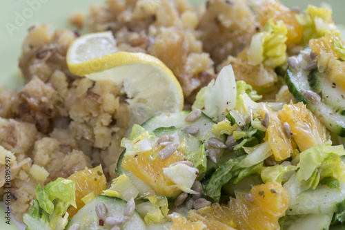 Mashed potatoes with salad ing of cucumbers and oranges I