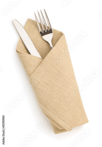 napkin, fork and knife isolated on white