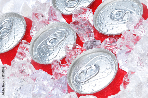 Close Up of Soda Cans in Ice