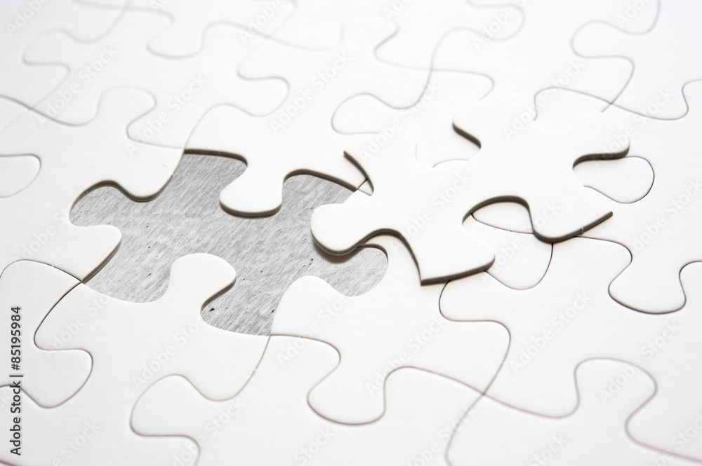 Jigsaw piece fill in blank, conceptual image Jigsaw piece fill in blank, conceptual image