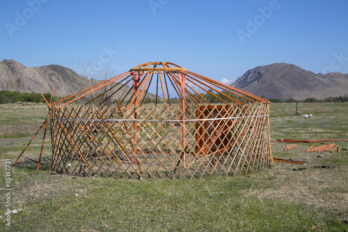 View of national asian yurt in mountains near Baikal lake photo