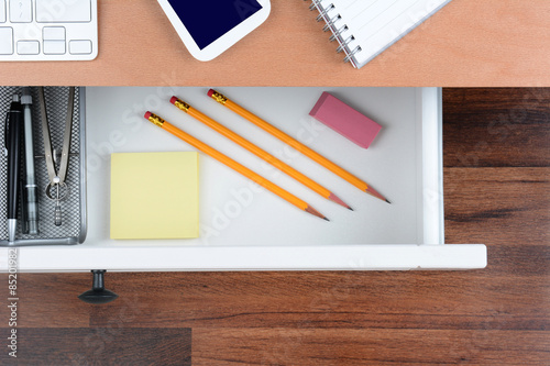 Fotografie Closeup Open Desk Drawer