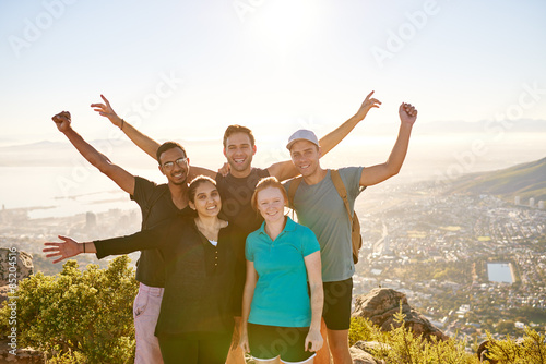 Group of student hikers posing on a mountain nature trail