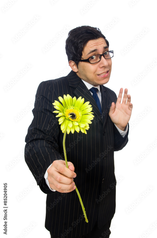 Young man in black costume with flower isolated on white Young man in black costume with flower isolated on white