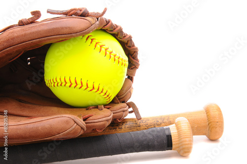 Softball Glove ball and two bats on white with copyspace