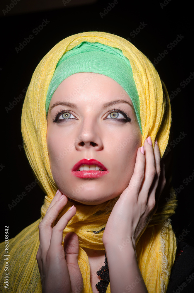 Serious woman wearing colourful headscarf Serious woman wearing colourful headscarf