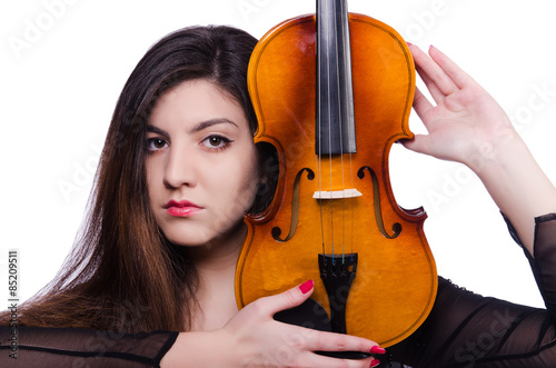 Woman performer playing violin on white