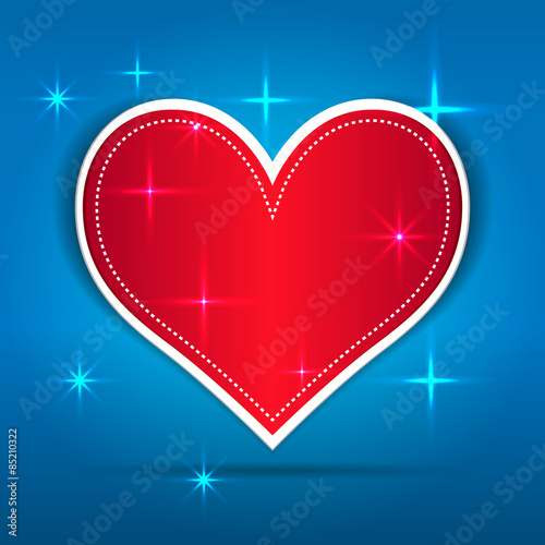 Red Paper Heart on blue background