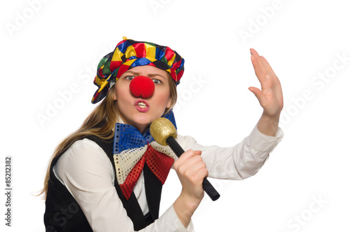 Pretty female clown with maracas isolated on white