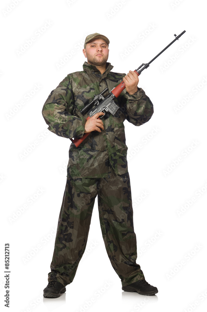Young man in soldier uniform holding gun isolated on white Young man in soldier uniform holding gun isolated on white