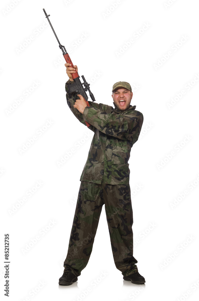 Young man in soldier uniform holding gun isolated on white Young man in soldier uniform holding gun isolated on white