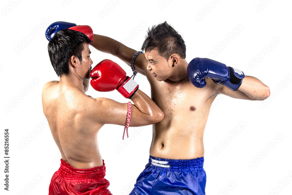 Two thai boxers exercising traditional martial art Two thai boxers exercising traditional martial art