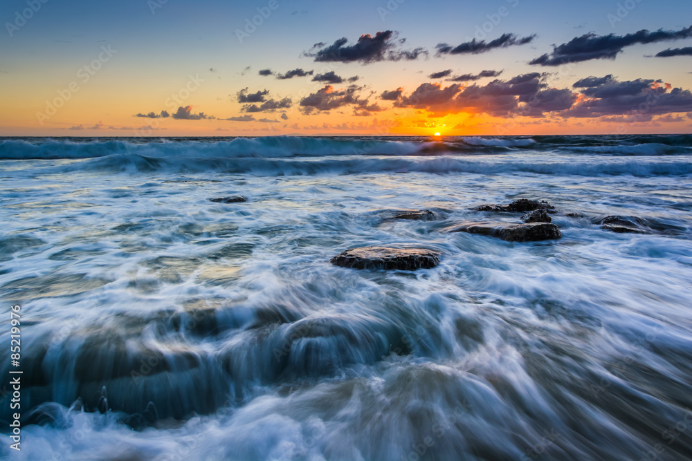 Waves in the Pacific Ocean at sunset, in Laguna Beach, Californi