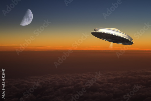 A UFO flies at high altitude over planet earth.
