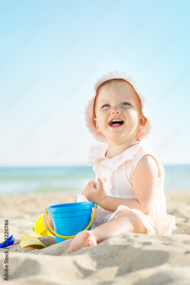 Baby playing at the sea Baby playing at the sea