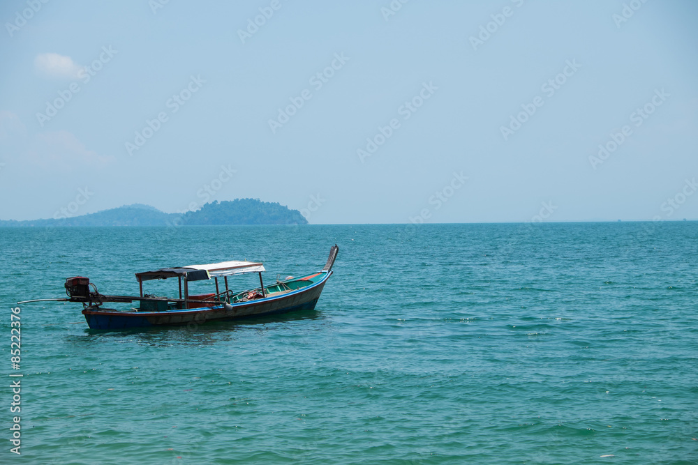 long-tailed boat in the sea