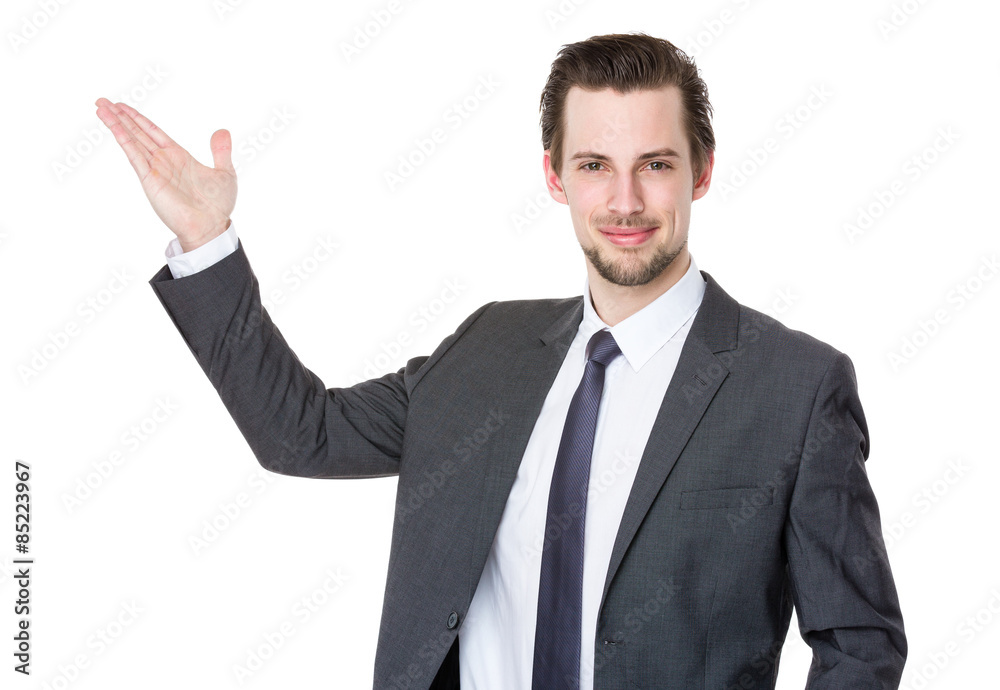 Caucasian businessman with hand showing with blank sign Caucasian businessman with hand showing with blank sign