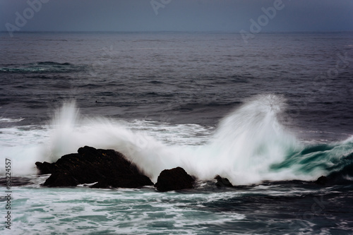 Waves and rocks in the Pacific Ocean  in Pacific Grove  Californ