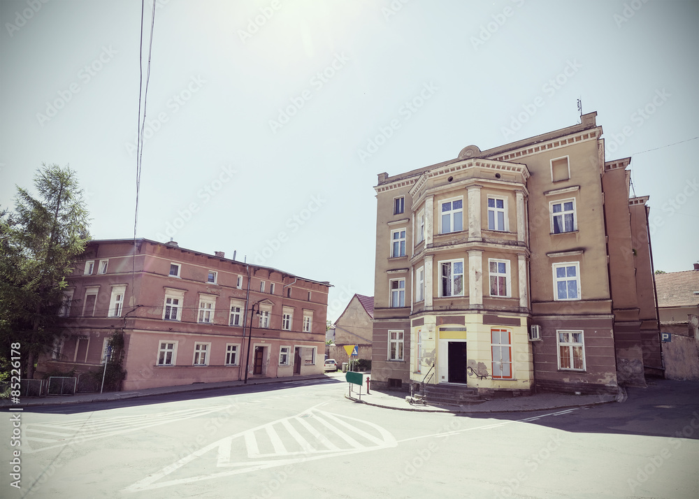 Retro toned empty street corner in Bolkow, Poland.