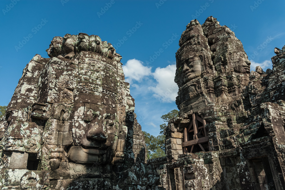 buddha statue inside a prasat in the complex of the bayon in the archaeological angkor thom place in siam reap, cambodia