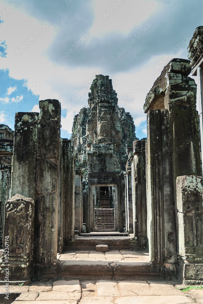 sight of the gallery of ruins of entry to the complex of the bayon in the archaeological place of angkor thom in siam reap, cambodia