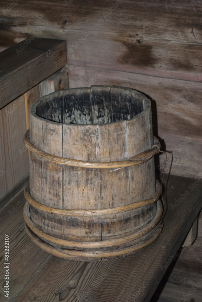 Russian home interior in the Middle Ages.Wooden barrel. Russian home interior in the Middle Ages.Wooden barrel.