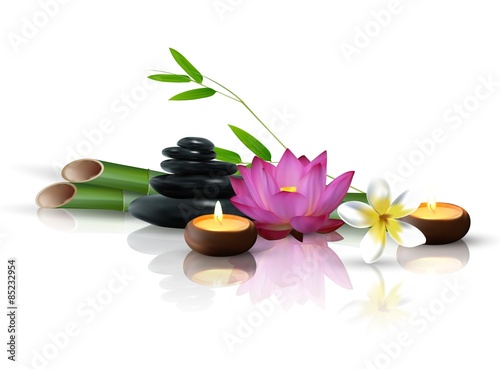 Bamboo, flowers, stone and wax isolated background.