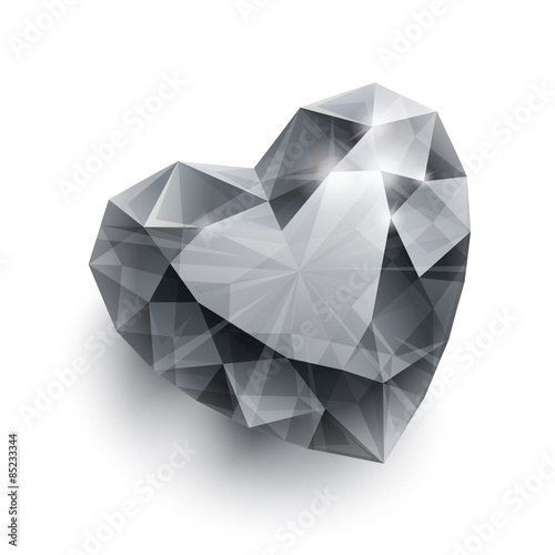 Shiny isolated diamond heart shape with shadow on white backgrou