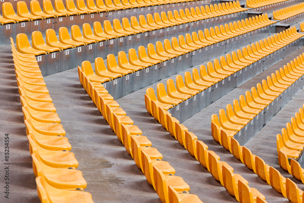 Obraz premium orange stadium seats tilt