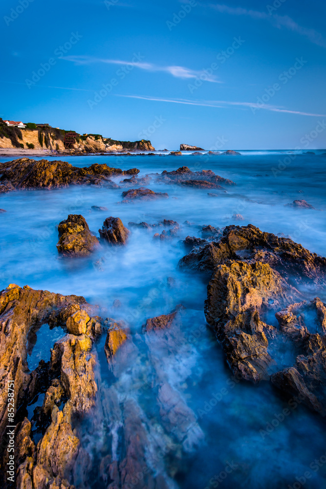 Rocks and tide pools at twilight, at Little Corona Beach, in Cor
