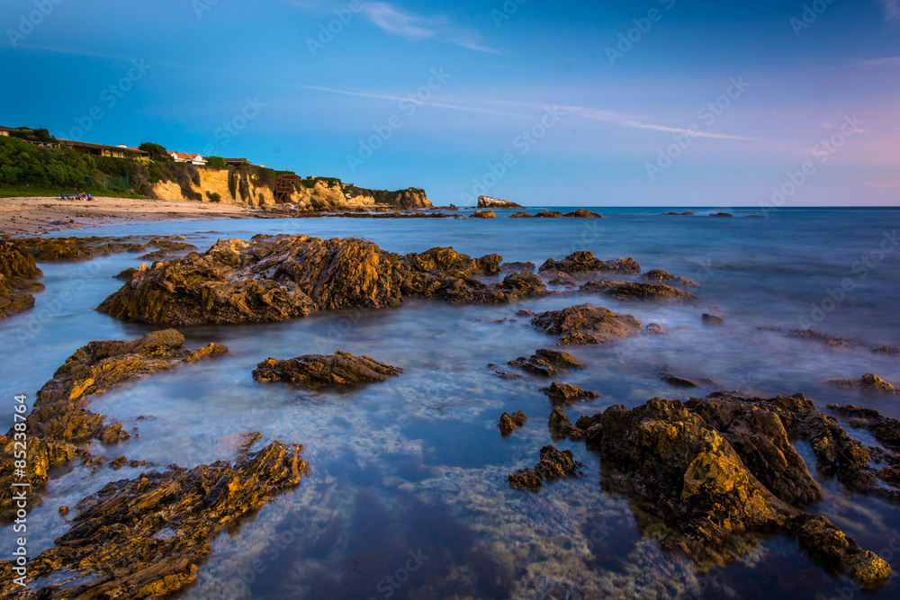 Rocks and tide pools at twilight, at Little Corona Beach, in Cor