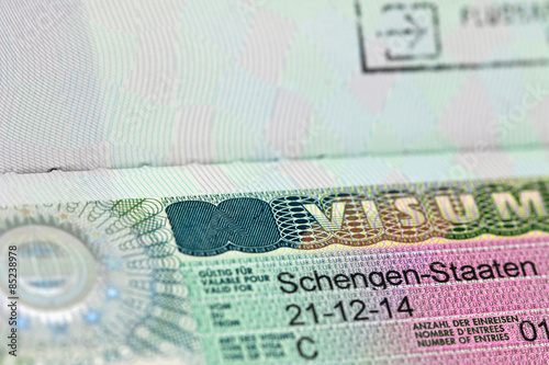 Closeup of the Schengen visa to Austria, Germany with shallow DOF