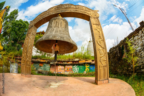 Giant bell at Tashiding monastery in Sikkim, India photo