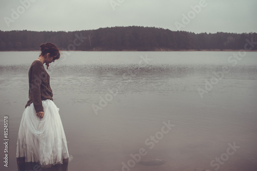 unusual woman in long skirt as concept outdoors