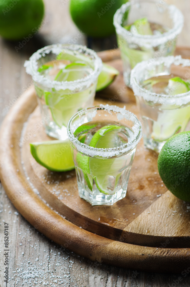 Silver mexican tequila with lime Silver mexican tequila with lime